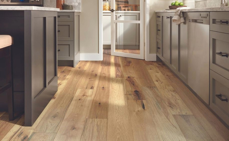 Beautiful Hardwood Plank Flooring Installed in a Kitchen.